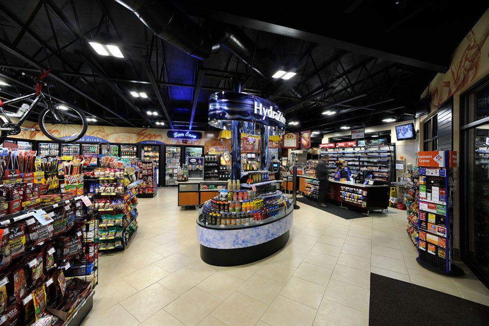 Cree 304 Series pendant-mount luminaires in the ExtraMile food market replaced 330-watt fluorescent fixtures